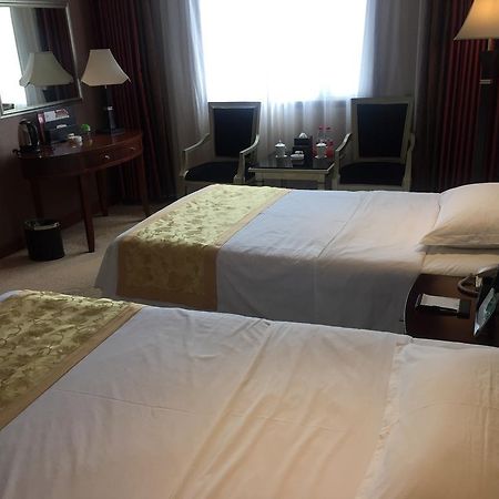 Yunheng Hotel Neijiang Bagian luar foto