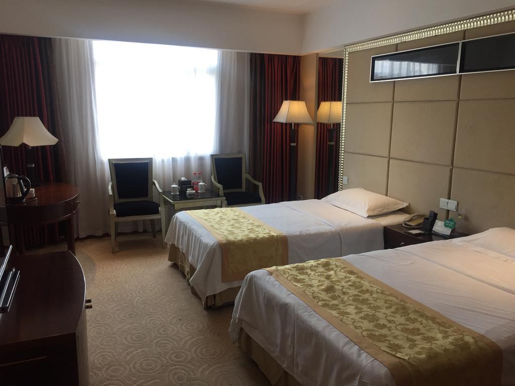 Yunheng Hotel Neijiang Bagian luar foto